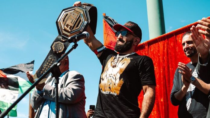 Belal Muhammad holding his UFC championship