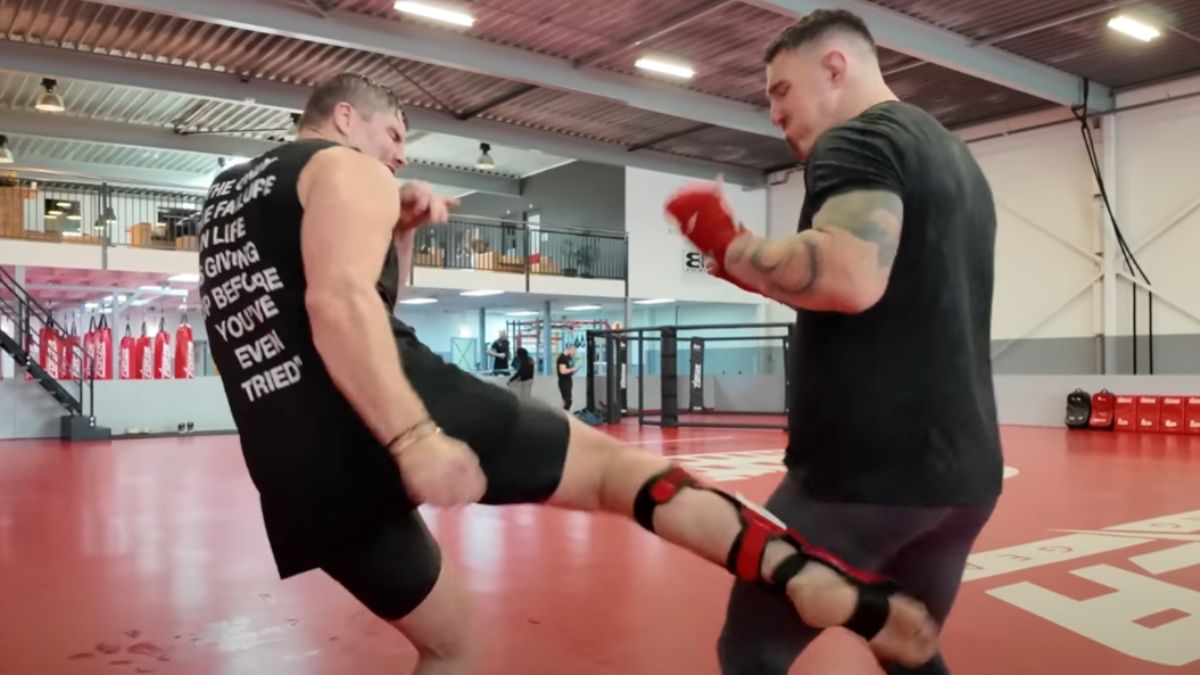 Watch Tom Aspinall Trade Kicks In Dead-Leg Contest With Kickboxing Champion
