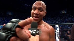 Ciryl Gane talking into a microphone