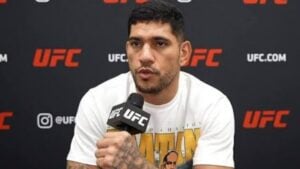 Alex Pereira and referee Herb Dean in the UFC Octagon