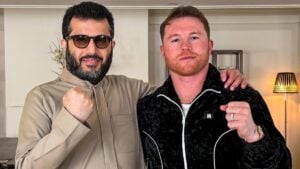 Turki Alalshikh and Canelo Alvarez posing together with raised fists