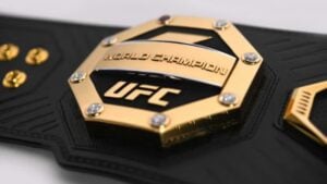 Close-up of a gold UFC world championship belt