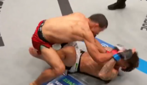 Sarvarjon Khamidov lands punches on a downed Rafael do Nascimento at PFL Chicago