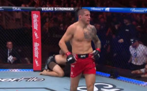 Marc-Andre Barriault stands in the Octagon after his first-round TKO of Kyle Daukaus at UFC Edmonton