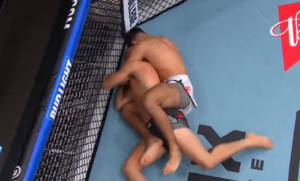 Nick Galanti works for a face crank submission against Julien Leblanc along the fence at UFC Edmonton