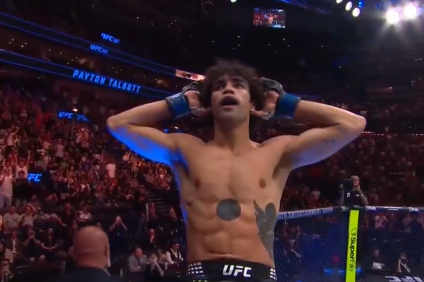 Payton Talbott celebrates inside the Octagon at UFC 332