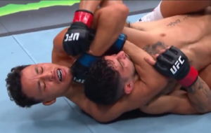 Timmy Cuamba locks in the fight-ending choke on Louis Jourdain at UFC Edmonton