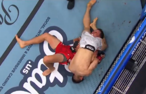 You Su-young and Cody Chovancek grapple on the canvas as You works a kimura in their bantamweight bout at UFC Edmonton
