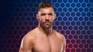 Former UFC middleweight champion Dricus du Plessis in a shirtless portrait against a blue and red hexagon background